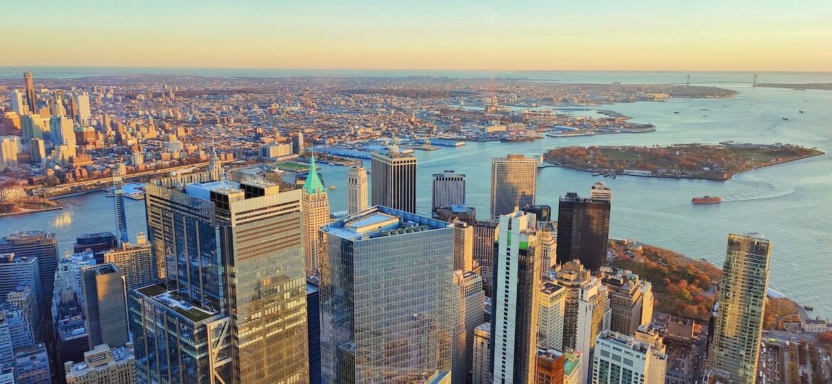 View over Manhattan and Brooklyn from One World Observatory at sunset