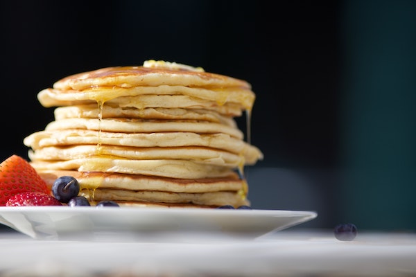 Stack of pancakes with fruit