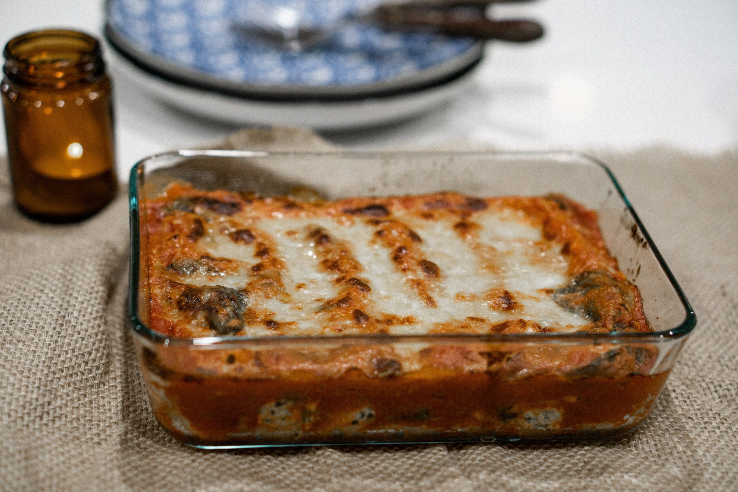 lasagna in glass casserole