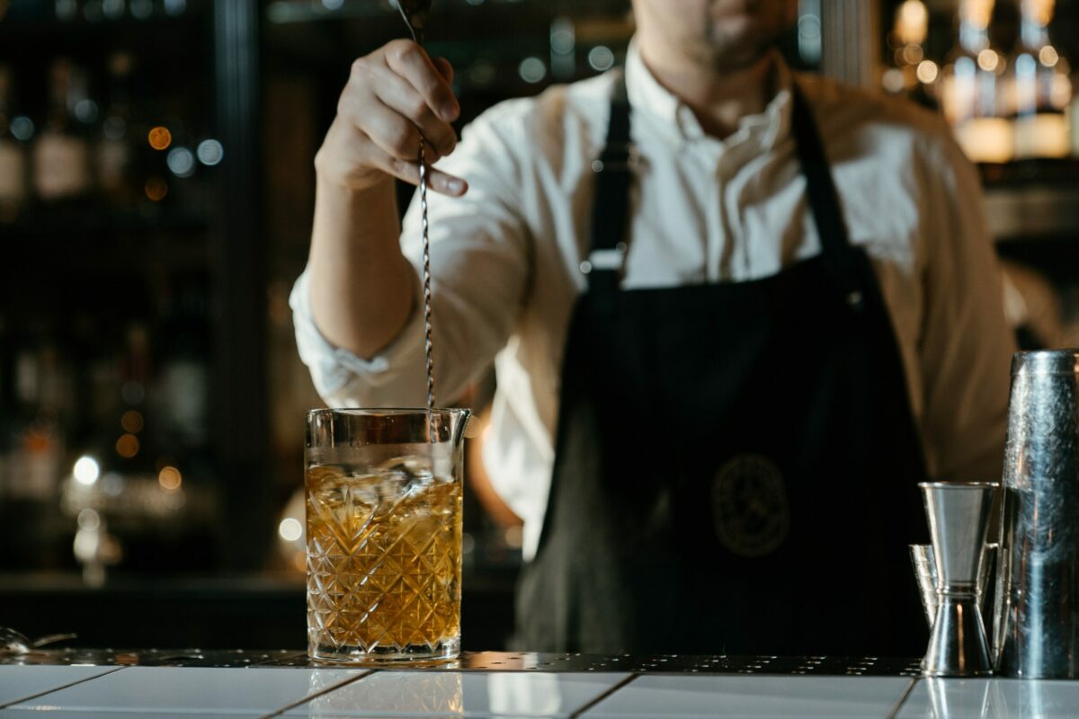 bartender stirring a drink