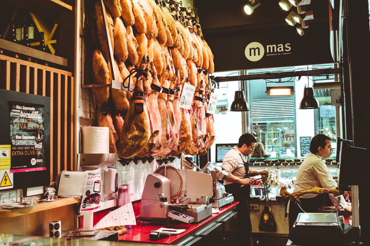 People selling traditional Spanish products in Barcelona