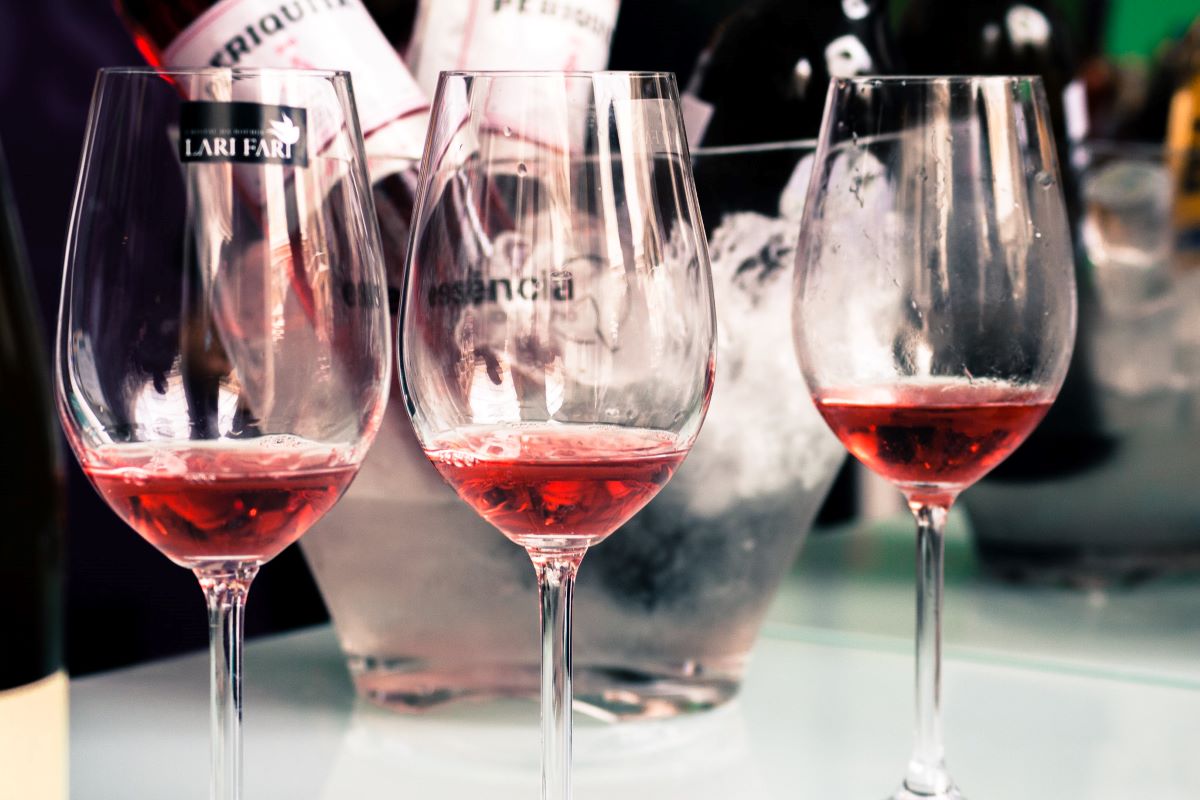 three wines glass with pink wine