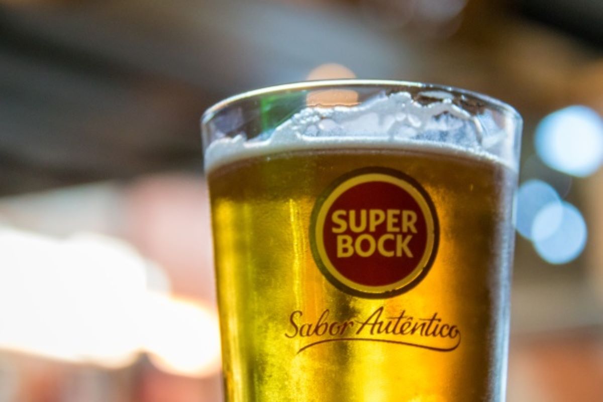 upclose image of glass of golden beer called Super Bock