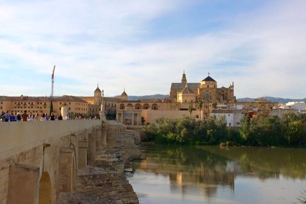 One of the top things to do in Cordoba is also one of the simplest: check out the view of the Mezquita from the Roman Bridge!