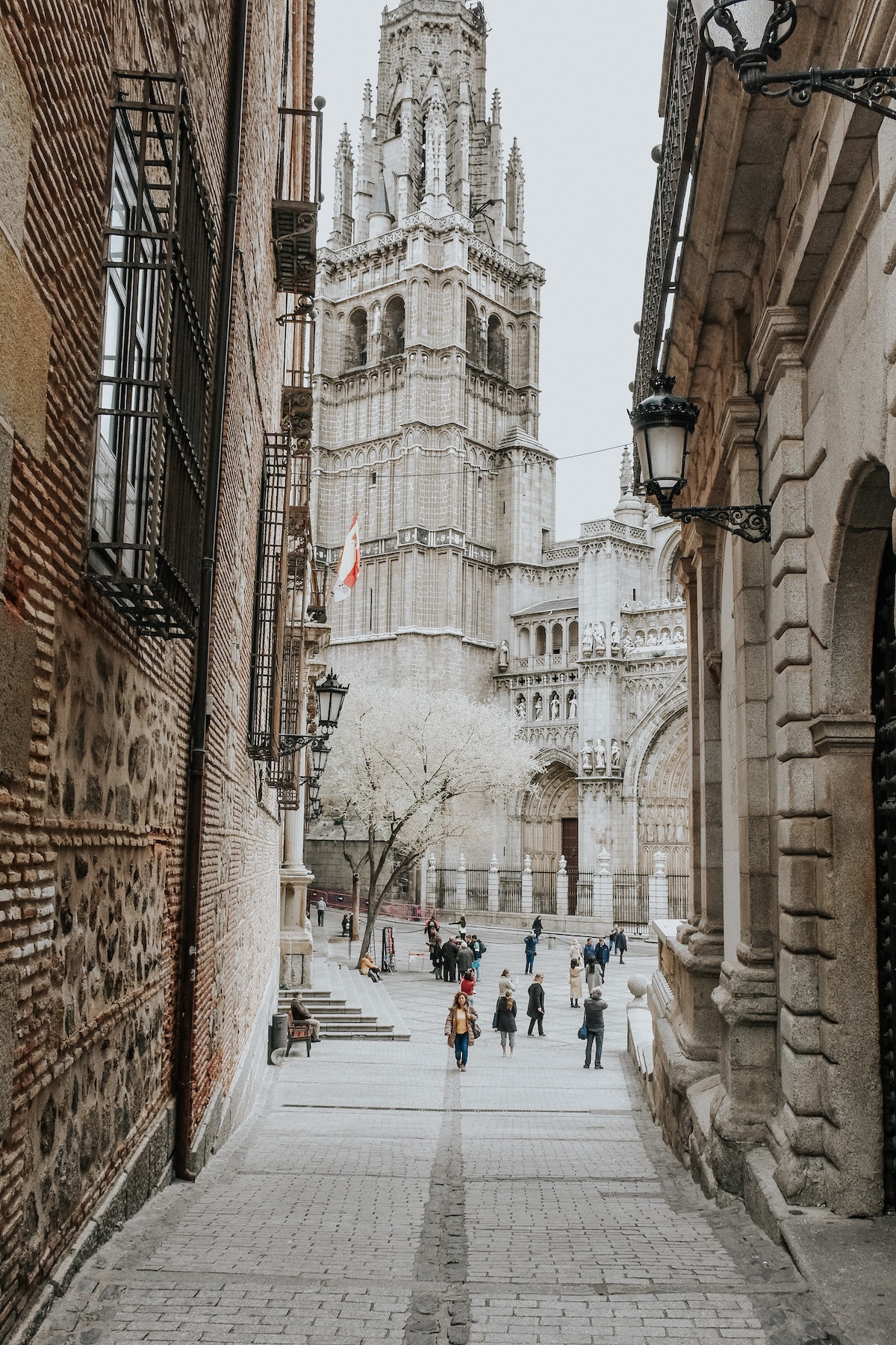 Street outside a large stone cathedral.