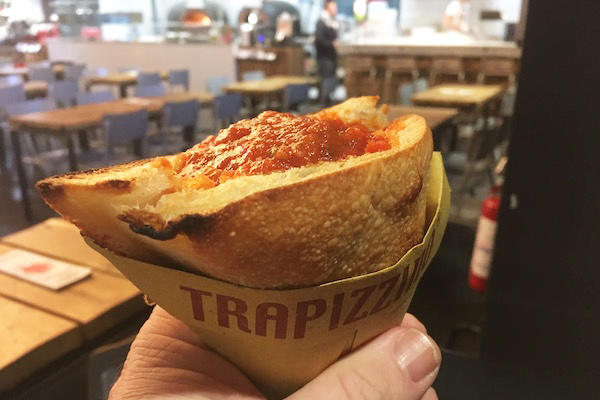 One of the most popular Rome street food bites, a trapizzino, is a pizza dough pocket stuffed with meatballs. 