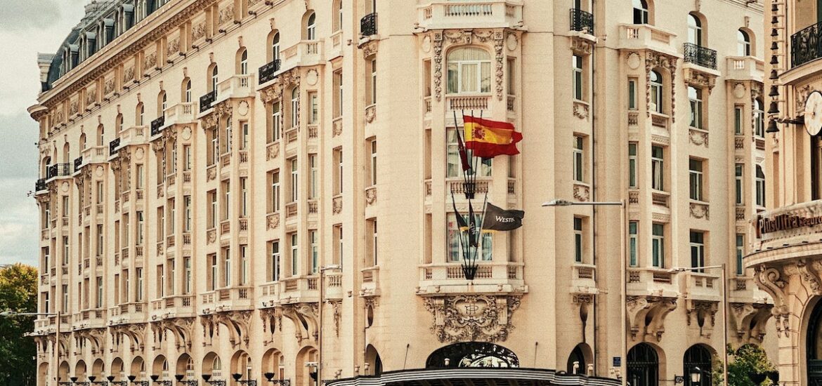 Exterior of a large white hotel building